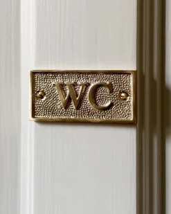 WC-skylt - Mässing